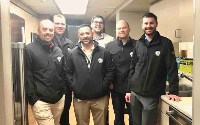 group of men volunteering